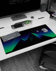 Artistic 36x16 inches desk pad featuring neon glowing pyramids, blending vaporwave and retrowave styles with vibrant colors.