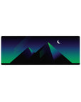 Compact 32x12 inches mouse pad with neon-inspired pyramids, illuminated with green and blue hues, capturing retro-futurism.
