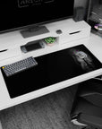 36x16 inches anime girl desk pad showing long-haired girl in white shirt and tie, plaid skirt, leaning in.