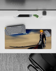 28x12 inches mouse pad with Ichigo wielding Zangetsu, desert winds, and deep blues for a powerful, determined design.