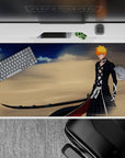 40x20 inches mouse pad showcasing Ichigo Kurosaki, wielding ultimate Zangetsu in desert winds with deep blues and golden sands.