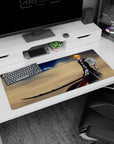 Artistic 36x16 inches mouse pad showcasing Ichigo, ultimate Zangetsu, desert winds, and golden sands for fierce determination.