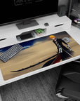 Large 40x20 inches mouse pad featuring Ichigo with Zangetsu, standing in desert winds with deep blues and golden sands for power.