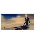 Mouse pad featuring Ichigo Kurosaki, 32x16 inches, with ultimate Zangetsu in desert winds and golden sands for a striking look.
