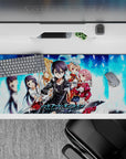 Sword Art Online desk pad 36x16 inches featuring Kirito, Asuna, Silica, Lisbeth, and Yui in pixelated blue and digital fire.