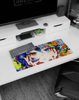 28x12 inches mouse pad showing an anime girl cradling her cheeks, amber and sapphire eyes, flowers.