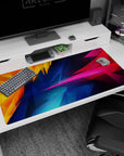 Large 40x20 inches desk pad featuring dynamic geometric patterns in bright, vibrant colors, transforming your workspace into a bold canvas of creativity.