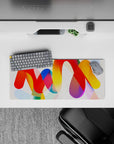 Compact 28x12 desk mat highlights red, yellow, blue, and orange hues for immersive creative vibes