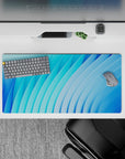 32x16 inches mouse pad with flowing blue curves in a minimalistic design, enhancing productivity and providing a clean, modern workspace look.