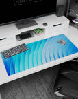 Elegant 36x16 inches desk pad showcasing abstract blue curves, perfect for a modern, organized workspace with a refreshing aesthetic.