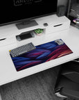 Abstract fiber waves mouse pad, 28x12 inches, showcasing textured strokes in blue, purple, and red, perfect for adding depth and motion to your workspace.