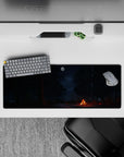 Peaceful 32x12 mouse pad featuring a campfire and starry sky in a moonlit forest, perfect for creating a tranquil atmosphere at your desk