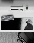 Intense 32x12 desk pad features Kaneki’s haunting smile and red eye with intricate monochrome details for fans of emotional artistry