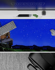 40x20 inches mouse pad with warrior design, blending deep blues and a starry sky for a peaceful, anime-inspired scene of strength and serenity.