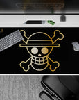 40x20 inches desk pad with the Straw Hat Pirates' golden Jolly Roger from One Piece, capturing the bold, adventurous spirit in a refined design.