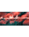Desk pad featuring abstract design, 36x16 inches, with dynamic red, black, and teal strokes for a creative, bold, and energetic workspace atmosphere.