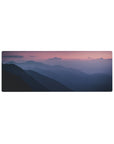 Twilight glow 32x12 mouse pad featuring serene mountains, soft purples, blues, and a pink horizon for a peaceful and calming workspace