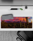 32x12 inches mouse pad featuring desert sunset design, with pink and orange skies and towering cacti for a Southwest vibe.
