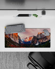 28x12 inches mouse pad with mountain landscape design, blending sun-kissed cliffs, snow-capped peaks, and a waterfall for a peaceful, nature-inspired vibe.