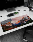 Artistic 36x16 inches mouse pad featuring mountain landscape design, with sun-kissed cliffs and a waterfall, capturing the serenity and beauty of nature.
