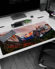 Large 40x20 inches mouse pad featuring mountain landscape design, with snow-capped peaks, sun-kissed cliffs, and a serene waterfall for nature lovers.