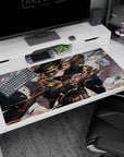 40x20 inches anime desk pad showing fierce officer girl mid-strike, curls flying, cape whipping, rifle wide.
