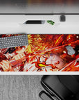 Rengoku-themed Demon Slayer anime desk pad, 36x16 inches, featuring flames and dynamic action, perfect for fans and gamers.