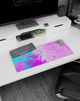 Artistic 28x12 inches mouse pad showcasing swirling hues of pink, purple, and turquoise in a liquid design, perfect for sparking creativity at your desk.