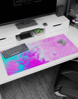 Vibrant 36x16 inches desk pad showcasing bold swirling colors in a pink liquid design, perfect for adding creativity and fun to your workspace.