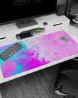 Large 40x20 inches pink liquid design desk pad with vibrant swirling colors, perfect for transforming your workspace with fun, inspiring energy.