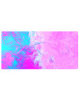 Mouse pad featuring a pink liquid design with swirling pink, purple, and turquoise hues, 32x16 inches, perfect for adding playful energy to your desk setup.