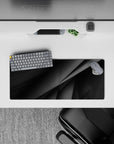 28x12 inches mouse pad with abstract overlapping shapes in monochrome tones, ideal for creating a sleek, visually dynamic desk setup.