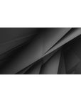 Desk pad featuring abstract overlapping shapes in rich black and gray tones, 40x20 inches, perfect for adding a sleek, modern aesthetic to your workspace.