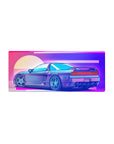 Mouse pad featuring the Neon Racer Drift, 28x12 inches, with a neon-lit sunset and sports car, adding a touch of speed and nostalgia.