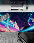 40x20 inches desk pad showcasing Goku in battle, surrounded by vibrant colors and powerful energy, ideal for fans of Dragon Ball Z.