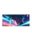 Mouse pad featuring Goku in Super Saiyan form, 28x12 inches, surrounded by vibrant colors and intense battle energy.