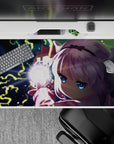 40x20 inches anime desk pad in midnight blues with neon yellow lightning and soft pink sleeves, moody vibe.