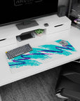 Artistic 32x12 inches mouse pad featuring vibrant abstract design, blending teal and purple brush strokes to evoke retro and creative energy.