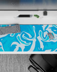 36x16 inches desk pad with fluid blue tones and swirling designs, blending bold colors and abstract aesthetics for a stylish workspace.