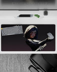 Anime girl mouse pad 32x16 inches in black and gray with crimson face streaks, fierce loyal vibe.