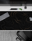 40x20 inches desk pad with golden topographic designs on a sleek black background, bringing sophisticated style and functionality to your desk setup.