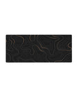 Mouse pad featuring elegant gold topographic lines on a black background, 28x12 inches, perfect for adding modern sophistication to your workspace.