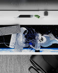 Moody black-and-white anime desk pad 36x16 inches with blue paint-splash accents and icy planet light.