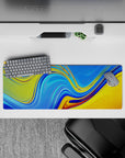 32x12 inches mouse pad with dynamic liquid wave patterns in bold colors, ideal for energizing your workspace with fluid, abstract art.