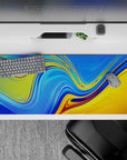 36x16 inches desk pad with bold liquid wave designs in vibrant blue and golden yellow, ideal for energizing your workspace with abstract art.
