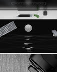 40x20 inches desk pad showcasing moonlit wave patterns in striking black and white, bringing serene, artistic beauty to your desk setup.