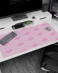 Large 40x20 inches desk pad featuring Akatsuki clouds in pink, capturing the rogue organization’s mysterious nature with a lighter twist.