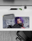 Compact 28x12 mouse pad showcasing Konan's commanding gaze and unique powers for anime enthusiasts