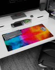 Bold 32x16 inches mouse pad showcasing cosmic color bursts with vibrant blues, pinks, and oranges, perfect for energizing and inspiring your desk.