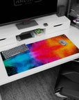 Artistic 36x16 inches desk pad showcasing chaotic cosmic colors, perfect for brightening your workspace with creativity and dynamic energy.